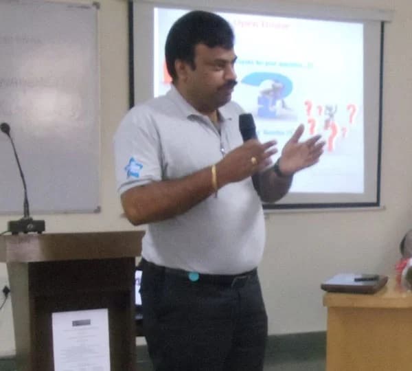 Dr. Koti Reddy Bhavanam speaking at a professional training session